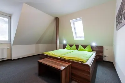 Ein Bett oder Betten in einem Zimmer der Unterkunft Apartment Felswelten