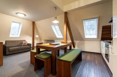 Ein Sitzbereich in der Unterkunft Apartment Felswelten