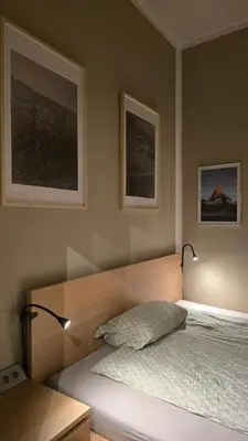 Ein Bett oder Betten in einem Zimmer der Unterkunft Kulturelles Businessapartment mit Balkon