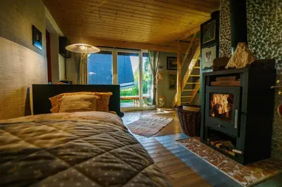 Ein Bett oder Betten in einem Zimmer der Unterkunft BERG WELT im Erzgebirge