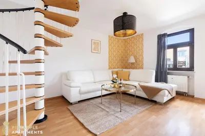 Ein Sitzbereich in der Unterkunft Neu! PINEAPPLE APARTMENTS - Zwinger XII - 96qm - 1x free parking