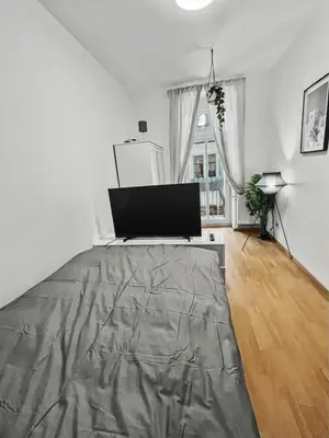 Ein Bett oder Betten in einem Zimmer der Unterkunft StayTime - Wildflower Suite