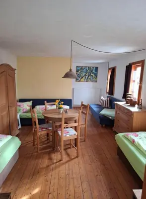 Ein Bett oder Betten in einem Zimmer der Unterkunft Appenhof Müllerhaus