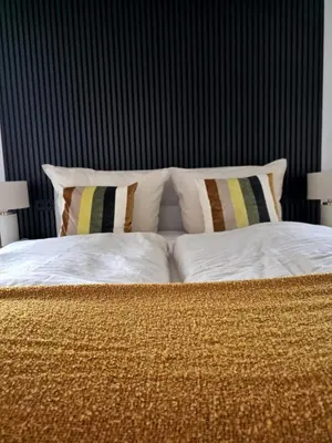 Ein Bett oder Betten in einem Zimmer der Unterkunft Ferienhaus Lyś
