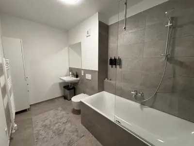Ein Badezimmer in der Unterkunft Neu in Dresden Stilvolles Apartment mit Balkon, Küche & Parkplatz