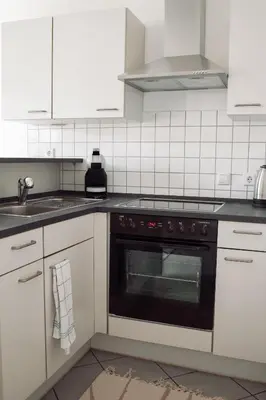 Küche/Küchenzeile in der Unterkunft Helles, modernes Apartment, Balkon, Fahrstuhl, 2P