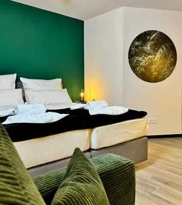 Ein Bett oder Betten in einem Zimmer der Unterkunft Ankommen & wohlfühlen - Ihr stilvolles Zuhause