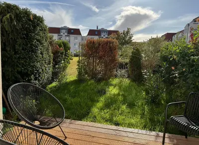Ein Garten an der Unterkunft Ankommen & wohlfühlen - Ihr stilvolles Zuhause