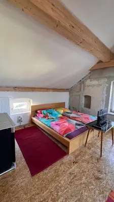 Ein Bett oder Betten in einem Zimmer der Unterkunft Ölschnitzer Loft