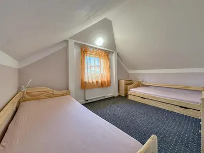 Ein Bett oder Betten in einem Zimmer der Unterkunft Kegel