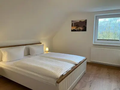 Ein Bett oder Betten in einem Zimmer der Unterkunft 4-Steine-Blick, Wohnung 1