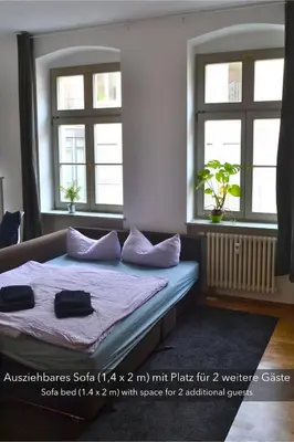 Ein Bett oder Betten in einem Zimmer der Unterkunft Ruhige, sehr zentrale Wohnung in der Altstadt