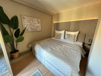 Ein Bett oder Betten in einem Zimmer der Unterkunft Elbflorenz