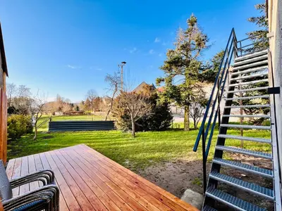 Ein Garten an der Unterkunft Moderne FeWo im Taubenhaus