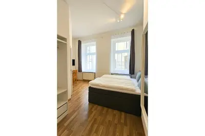 Ein Bett oder Betten in einem Zimmer der Unterkunft LUMA Apartments