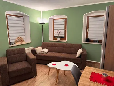 Ein Sitzbereich in der Unterkunft Apartment Wuff Altendorf