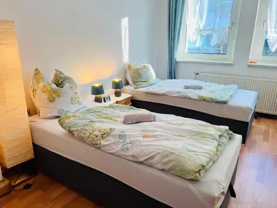 Ein Bett oder Betten in einem Zimmer der Unterkunft Ferienwohnung am ElbeFreizeitland - Panoramablick - free parking