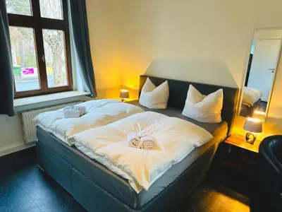 Ein Bett oder Betten in einem Zimmer der Unterkunft Hotel an der Rennbahn Kostenloses Parken