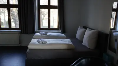 Ein Bett oder Betten in einem Zimmer der Unterkunft Hotel an der Rennbahn Kostenloses Parken