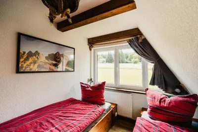 Ein Bett oder Betten in einem Zimmer der Unterkunft Ferienhaus Lärchenblick