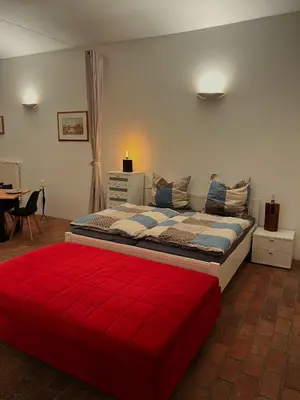 Ein Bett oder Betten in einem Zimmer der Unterkunft Gewölbekammer Lichtenwalde
