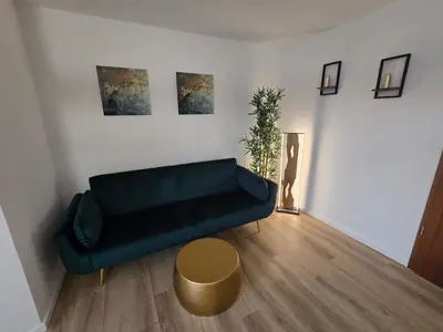 Ein Sitzbereich in der Unterkunft WohnTraum Im Grünen, Balkon