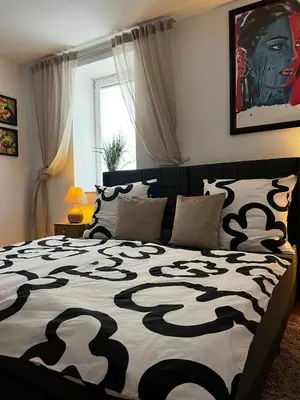 Ein Bett oder Betten in einem Zimmer der Unterkunft Apartment im Grünen -Garden