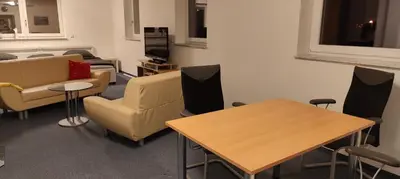 Ein Sitzbereich in der Unterkunft Family Room Grüne Auszeit Dresden