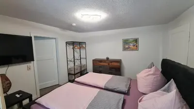Ein Bett oder Betten in einem Zimmer der Unterkunft Ferienwohnung Hugos Altstadt
