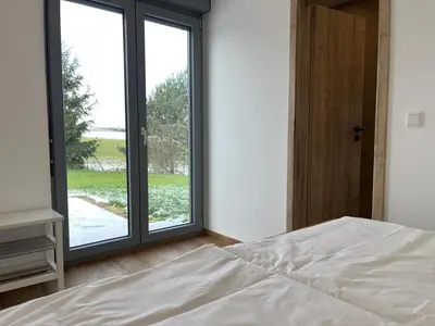 Ein Bett oder Betten in einem Zimmer der Unterkunft 4-Steine-Blick, Wohnung 3