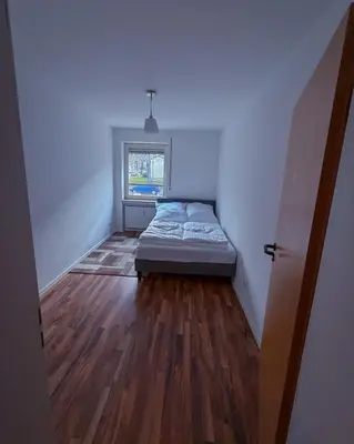 Ein Bett oder Betten in einem Zimmer der Unterkunft Wohnung am Hauptbahnhof
