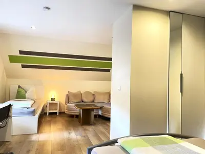 Ein Sitzbereich in der Unterkunft Zimmer & Ferienwohnung Steuer