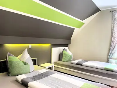 Ein Bett oder Betten in einem Zimmer der Unterkunft Zimmer & Ferienwohnung Steuer