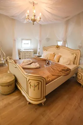 Ein Bett oder Betten in einem Zimmer der Unterkunft Hotel garni Schloss Grochwitz