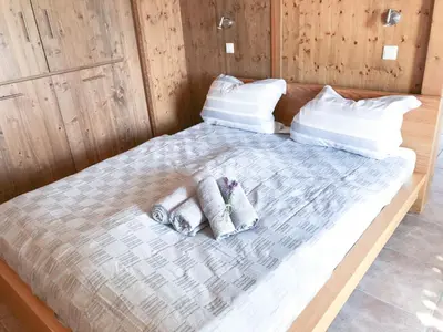 Ein Bett oder Betten in einem Zimmer der Unterkunft Apartment Gemütliche Wohnung in Niederpoyritz mit Garten by Interhome