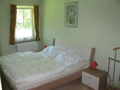 Ein Bett oder Betten in einem Zimmer der Unterkunft Apartment Wolfsgrund by Interhome