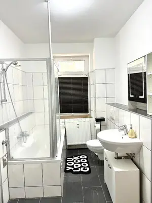 Ein Badezimmer in der Unterkunft Aparthotel mit Balkon