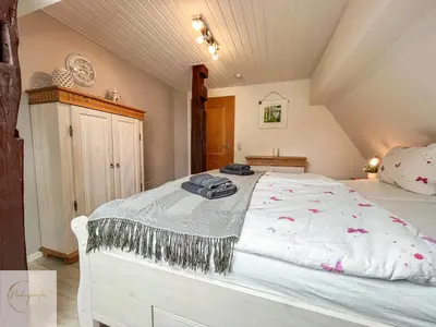 Ein Bett oder Betten in einem Zimmer der Unterkunft Cozy Apartment Rooftop Churchplace