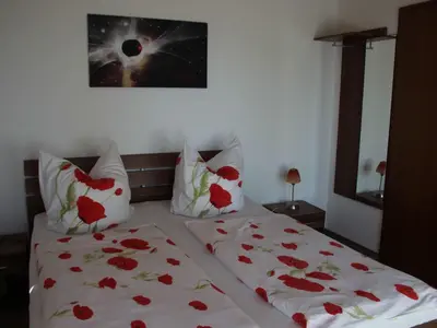 Ein Bett oder Betten in einem Zimmer der Unterkunft Holiday Home FH am Oberteich by Interhome