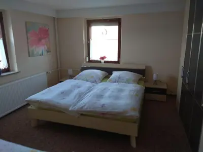 Ein Bett oder Betten in einem Zimmer der Unterkunft Apartment mit eigenem Parkplatz by Interhome