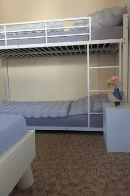 Ein Etagenbett oder Etagenbetten in einem Zimmer der Unterkunft Apartment mit eigenem Parkplatz by Interhome