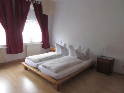 Ein Bett oder Betten in einem Zimmer der Unterkunft Apartment Blaues Haus by Interhome