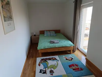 Ein Bett oder Betten in einem Zimmer der Unterkunft Am Altfrankener Park