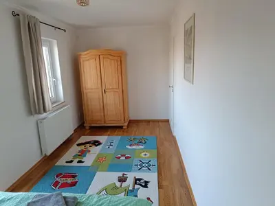 Ein Bett oder Betten in einem Zimmer der Unterkunft Am Altfrankener Park