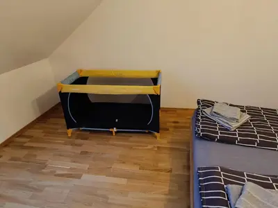 Ein Bett oder Betten in einem Zimmer der Unterkunft Am Altfrankener Park