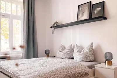Ein Bett oder Betten in einem Zimmer der Unterkunft Hübschmann, App 128