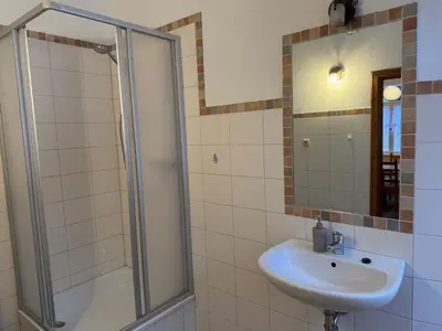 Ein Badezimmer in der Unterkunft Ferienwohnung Pfaffenstein in der alten Försterei
