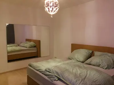 Ein Bett oder Betten in einem Zimmer der Unterkunft Fabelhafte Ferienwohnung in Dresden Neustadt