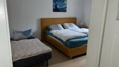 Ein Bett oder Betten in einem Zimmer der Unterkunft Fabelhafte Ferienwohnung in Dresden Neustadt