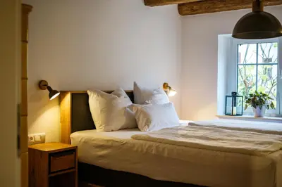 Ein Bett oder Betten in einem Zimmer der Unterkunft Rotes Nest